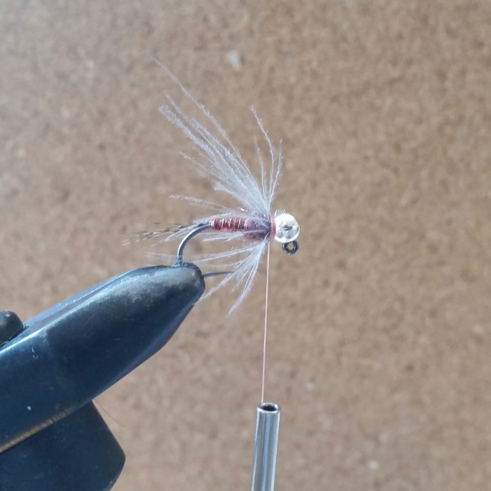 Make just one turn and tie in. It's too easy to get excited here and treat this like a dry fly hackle but the more turns you make here the less movement you'll get from the fibres. Remember these bugs have six legs not sixty! I throw two whip finishes in now, this means that in the future if the final part of the fly unravels I can untie to this point and finish it again rather than throw it away - how northern is that?!